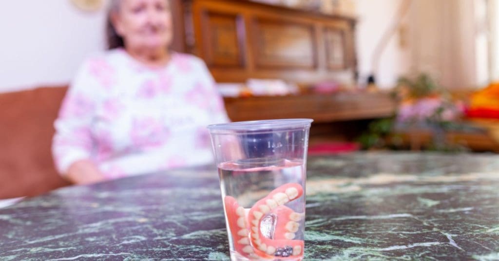 Loose Dentures: What To Do & How To Fix