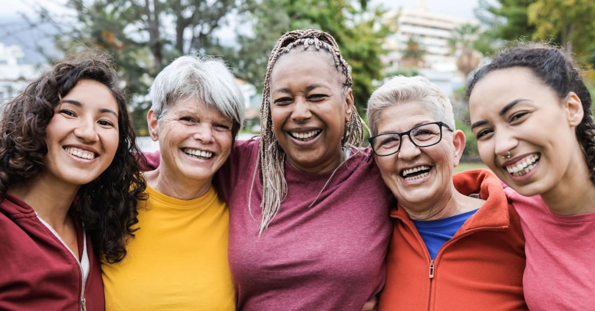 5 women smiling
